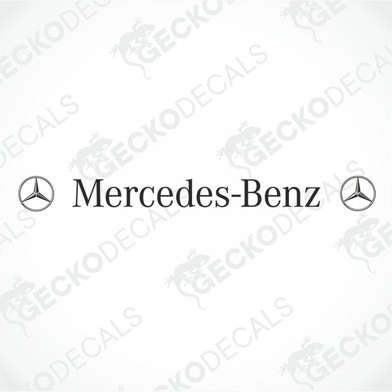 A front view of a Mercedes-Benz truck with a die cut decal on its windscreen.
