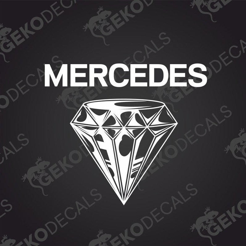 A decal with the text 'MERCEDES' above a diamond shape design, typically used for vehicle customization.
