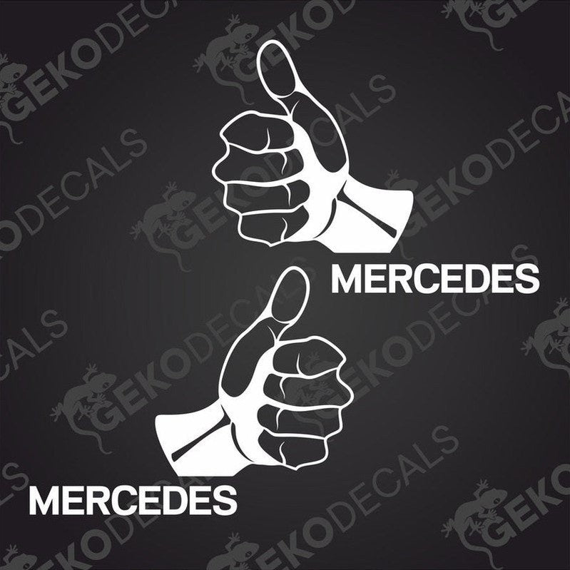 Two black decals with the word 'MERCEDES' and a thumbs up gesture.