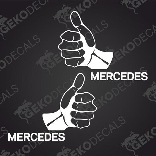 Two black decals with the word 'MERCEDES' and a thumbs up gesture.