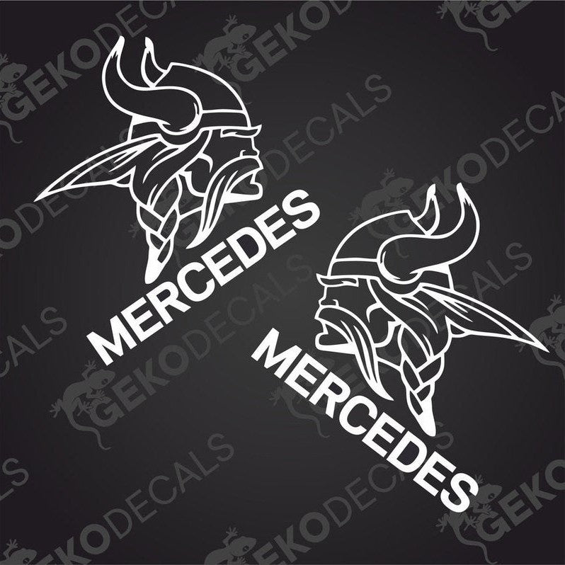 Two black decals with a Viking helmet design and the word 'MERCEDES' below them.