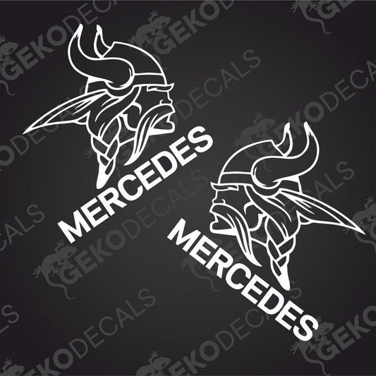 Two black decals with a Viking helmet design and the word 'MERCEDES' below them.