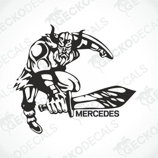 A black and white die cut decal of a Viking holding a sword with the Mercedes logo on the blade.
