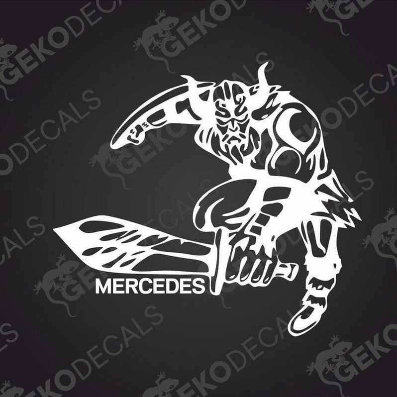 A black die cut sticker of a Viking character with the Mercedes brand logo