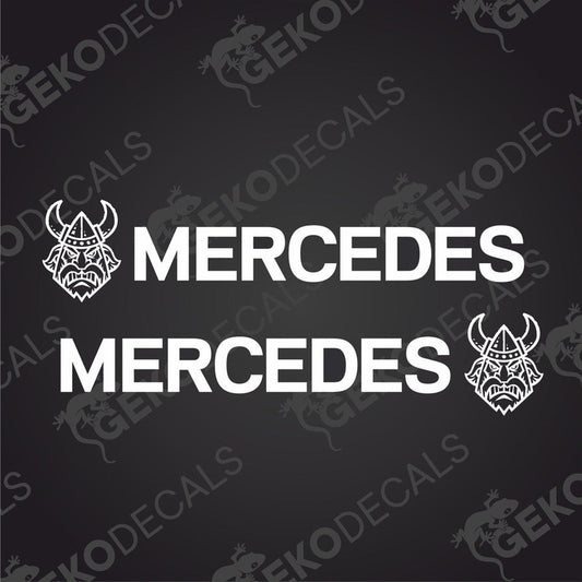 Two white decal stickers with the text 'MERCEDES' and a Viking helmet design, one for the left and one for the right side.