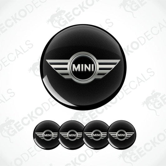 Set of black MINI car logo stickers on a white background
