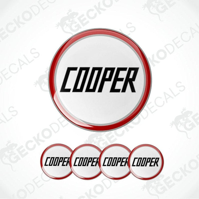 Set of Cooper logos with red and white design on a light gray background
