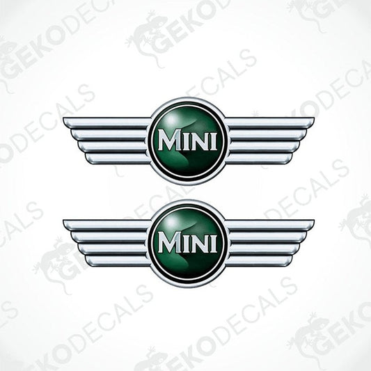 Two vinyl stickers with a MINI COOPER branding, featuring a green and silver emblem design.