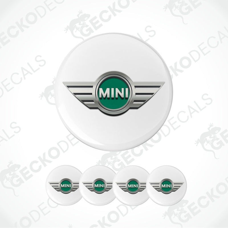 Set of five MINI car logo emblems on a white background