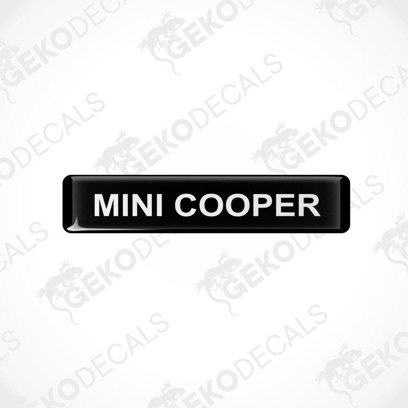  Black rectangular car decals with the text 'MINI COOPER' in white.