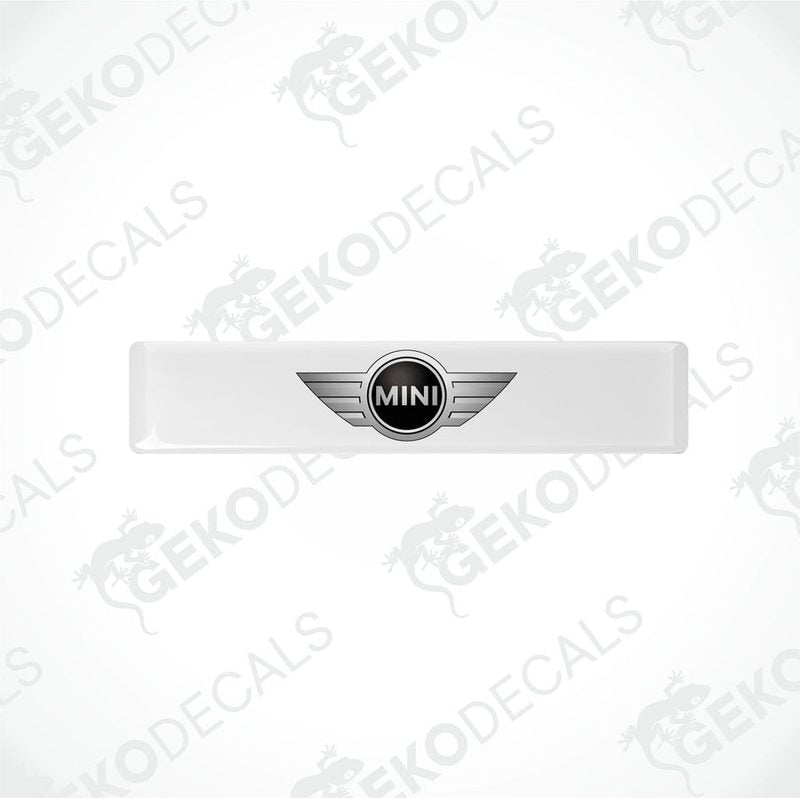 White, silver, and black vinyl decals with the Mini Cooper logo