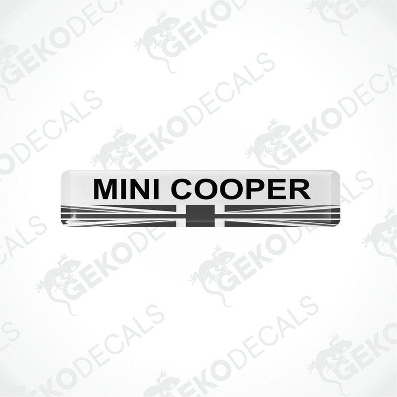 White, black, and red vinyl decals with the text 'MINI COOPER' on them.