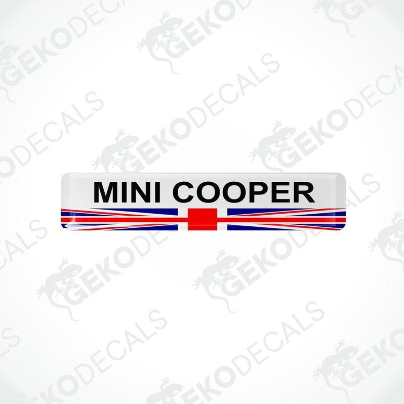 Vinyl stickers with a MINI COOPER branding and a design resembling the British flag in red, white, and blue.