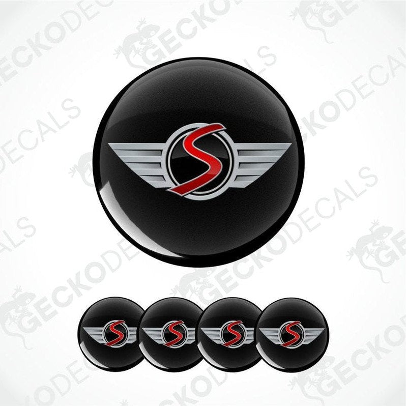 Black round decal with a red and silver logo on a white background