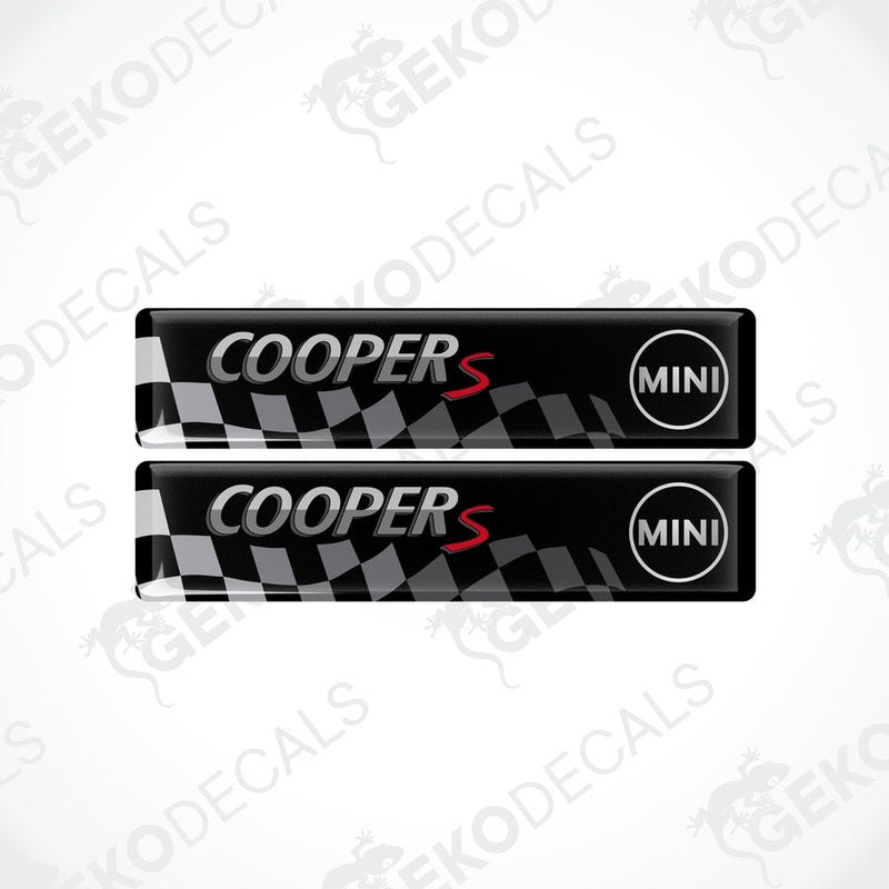 Two black vinyl stickers with the text 'COOPER S' and a checkered pattern design.