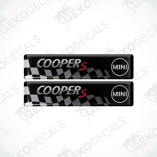 Two black vinyl stickers with the text 'COOPER S' and a checkered pattern design.