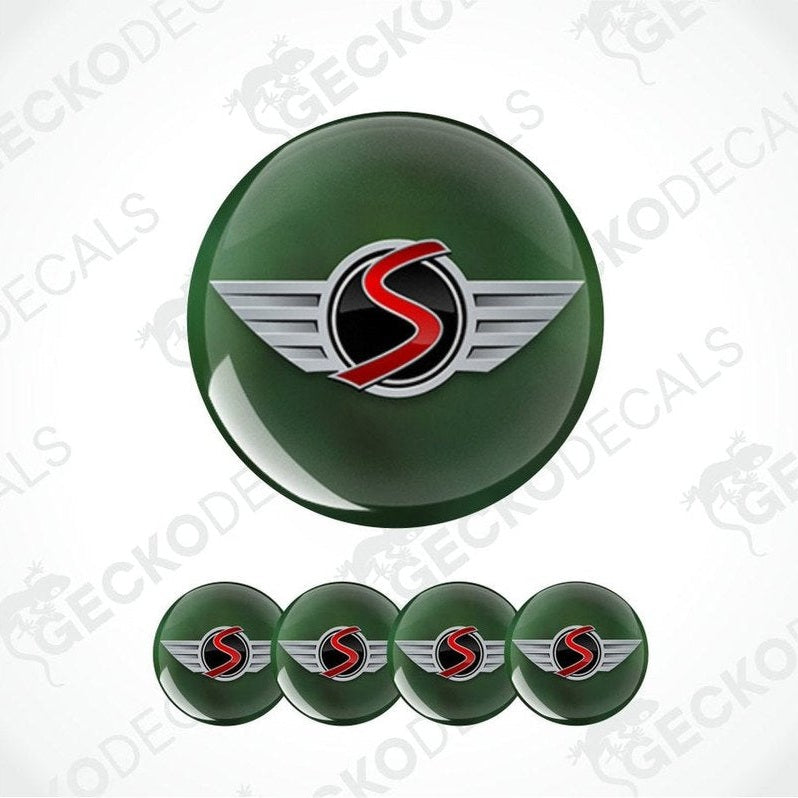 Set of green round decals with a logo on a white background
