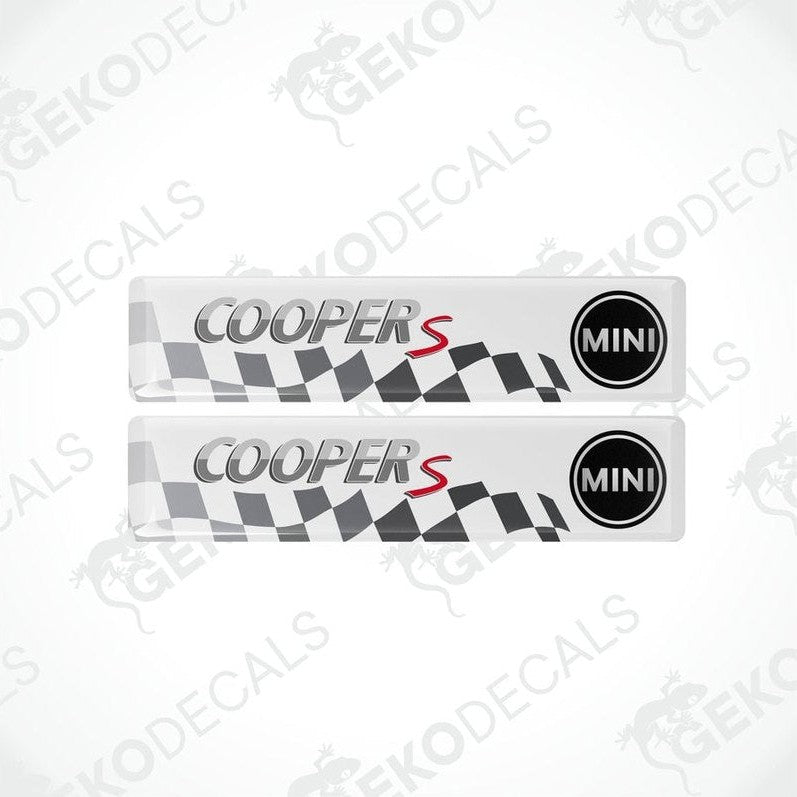 Two white vinyl stickers with the text 'COOPER S' and a checkered pattern design, placed against a black background with the GeckoDecals logo.