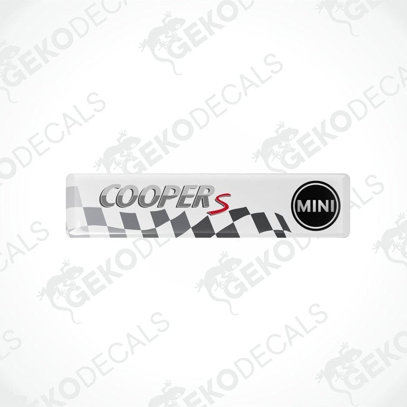 White vinyl stickers with the text 'COOPER S' and a checkered pattern design, placed against a black background with the GeckoDecals logo.