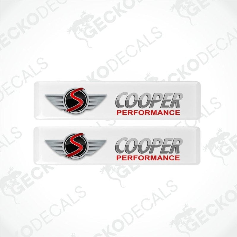 Two 'Cooper Performance' decals with a logo on a white background.