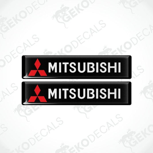 Two rectangular black vinyl decals with the Mitsubishi logo in red and white.