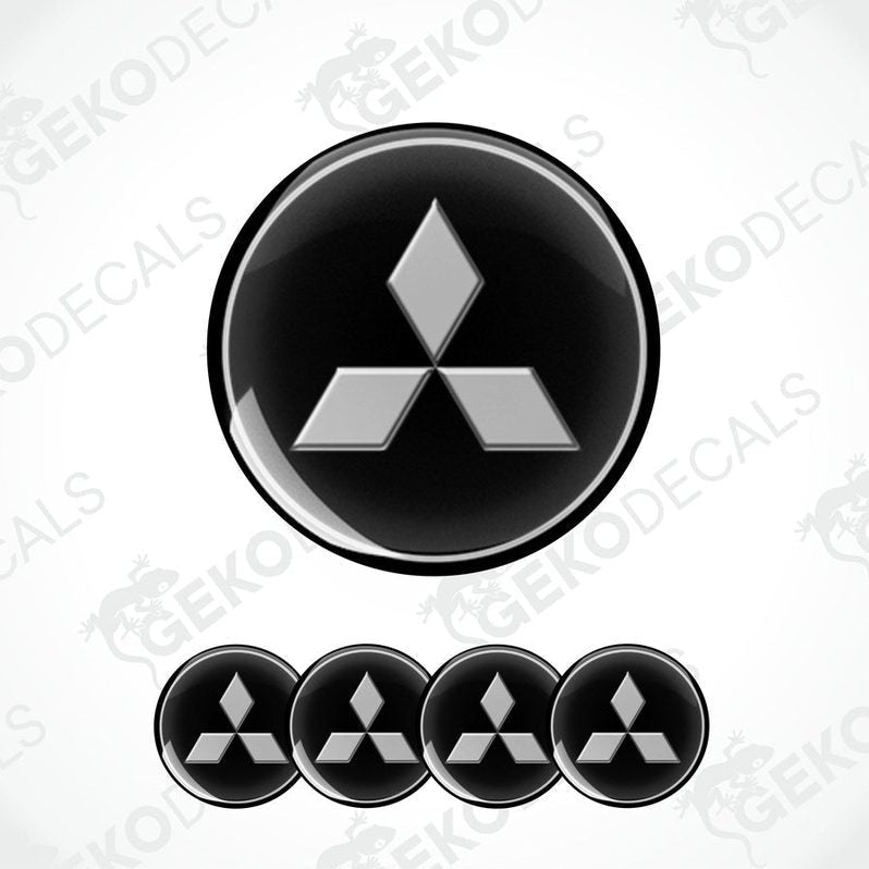 A set of four black vinyl stickers with a diamond-shaped design, representing the Mitsubishi brand.
