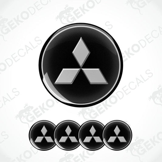 A set of four black vinyl stickers with a diamond-shaped design, representing the Mitsubishi brand.