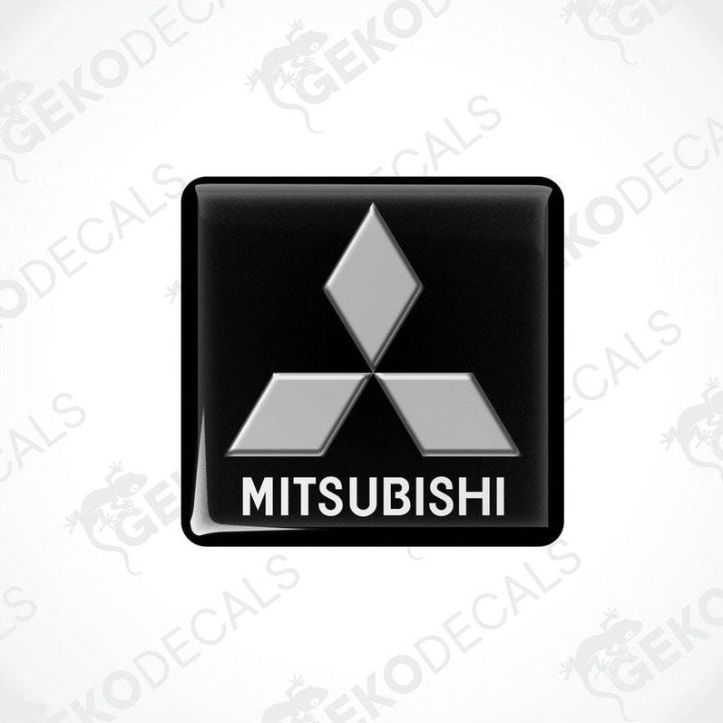  Black vinyl stickers with a white Mitsubishi logo on each, placed against a white background.