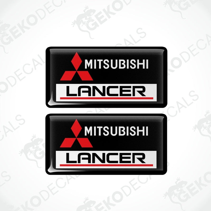 Two black vinyl stickers with red and white Mitsubishi Lancer branding.