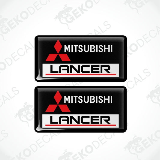 Two black vinyl stickers with red and white Mitsubishi Lancer branding.