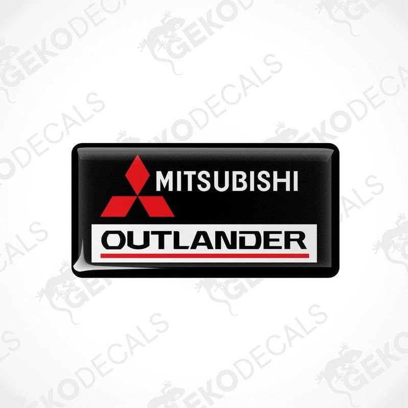 Black vinyl stickers with red and white Mitsubishi Outlander branding.