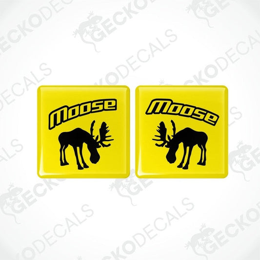 Two yellow square vinyl decals with the silhouette of a moose and the text 'VOLVO MOOSE' below it.
