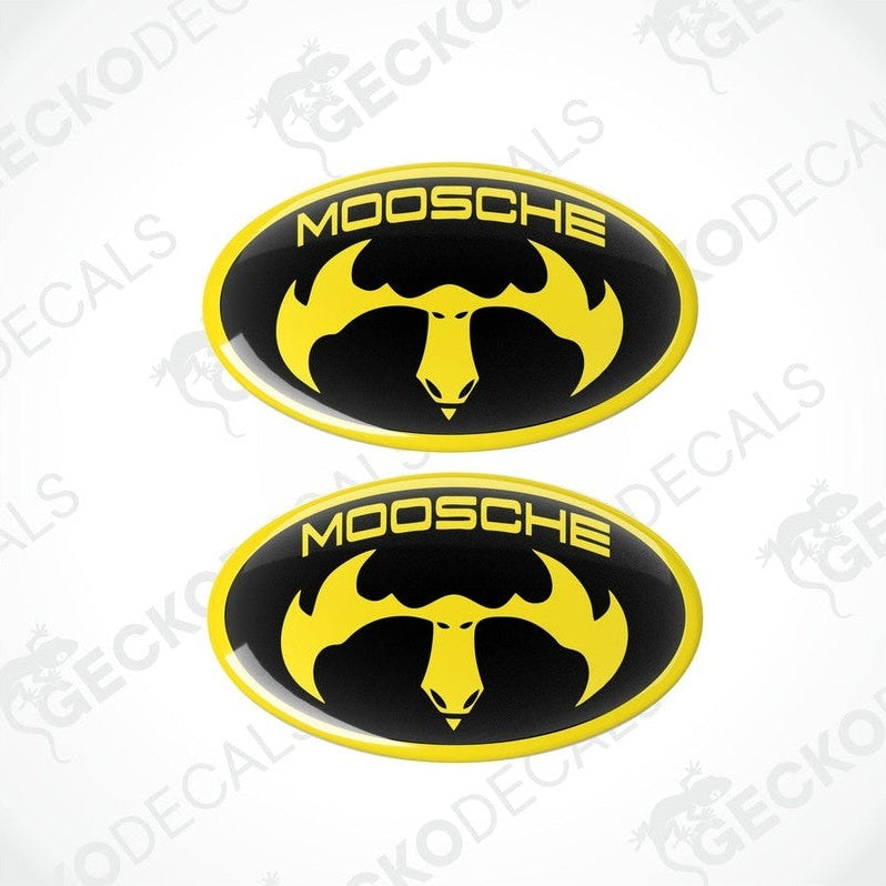 Two black oval car decals with the text 'MOOSCHE' and a moose silhouette in yellow.