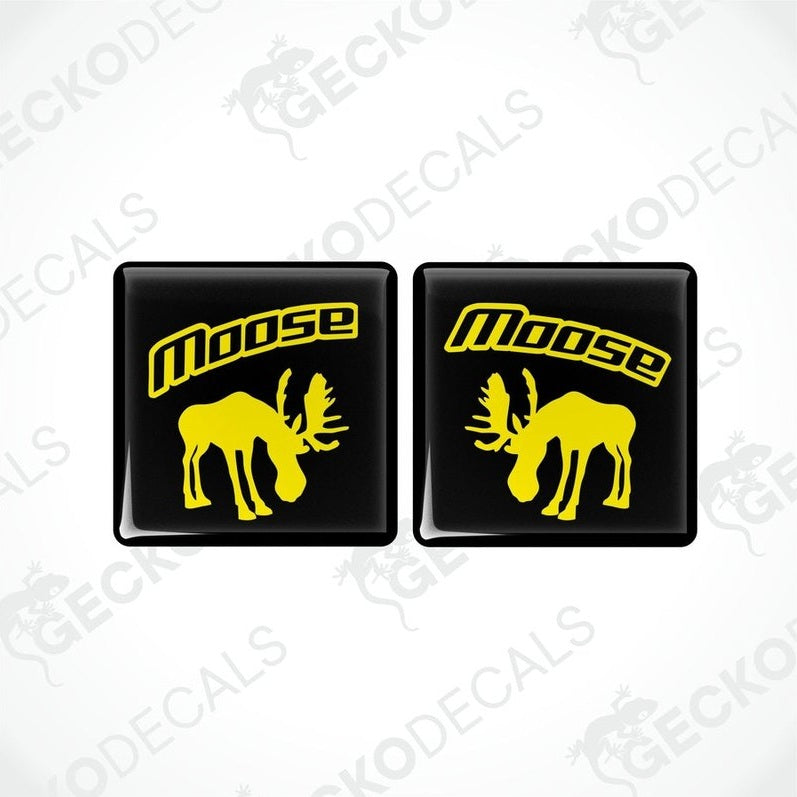 Two black square vinyl decals with the silhouette of a moose and the text 'VOLVO MOOSE' below it.