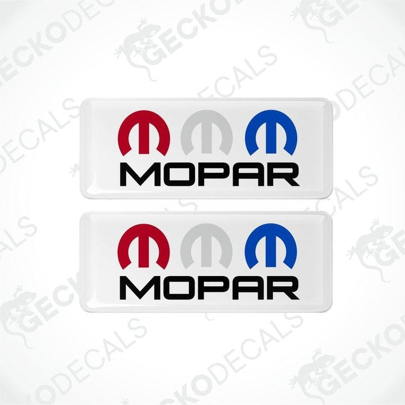 Two rectangular MOPAR branded vinyl decals with a red, white, and blue color scheme.