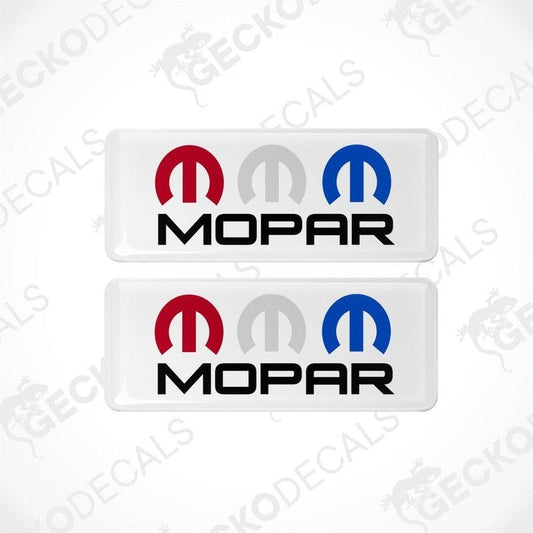 Two rectangular MOPAR branded vinyl decals with a red, white, and blue color scheme.
