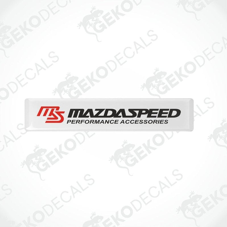 White vinyl stickers with the MazdaSpeed Performance Accessories logo in red and black.