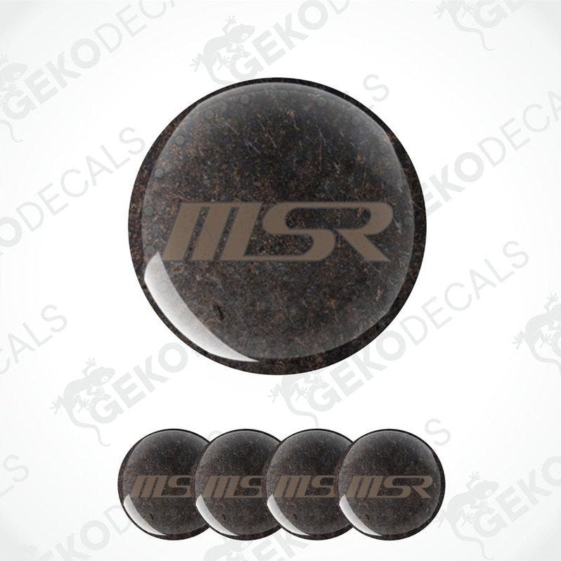A set of four brown vinyl stickers with a brown 'MSR' logo, designed for car rim stickers.