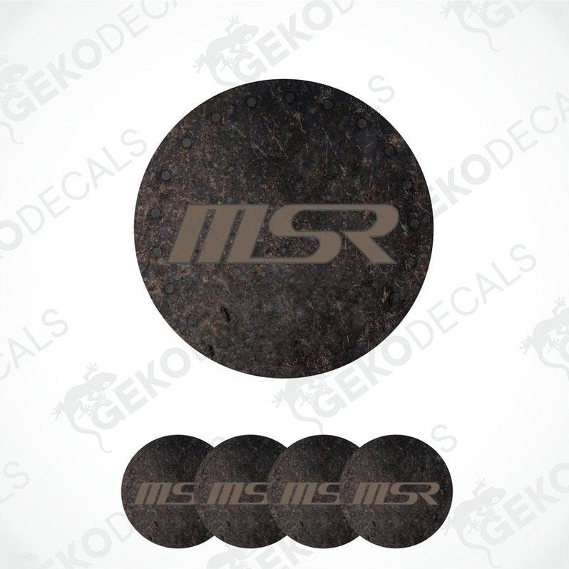 A set of four brown vinyl stickers with a brown 'MSR' logo, designed for car rim stickers.