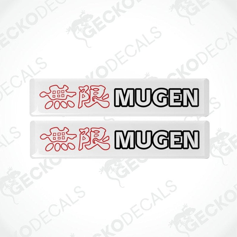 Two white vinyl stickers with red and black text and graphics, including the word 'MUGEN'.