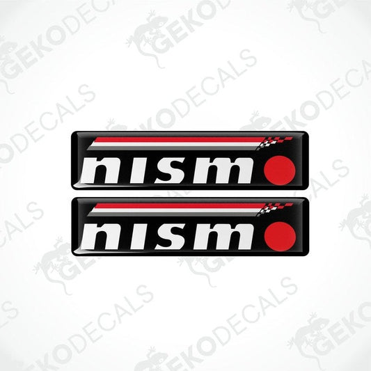 Two black, red, and white vinyl stickers with a checkered pattern and the NISMO brand logo.