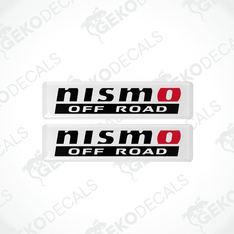 Two white, red, and black vinyl stickers with a checkered pattern and the NISMO  OFF ROAD  brand logo.