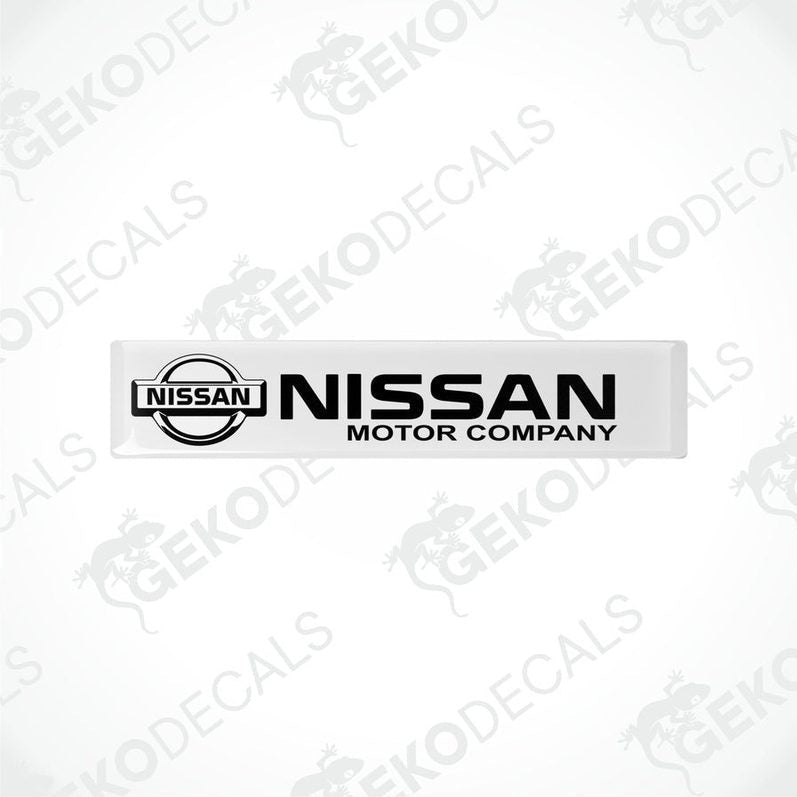 White vinyl stickers with the NISSAN Motor Company logo in black.