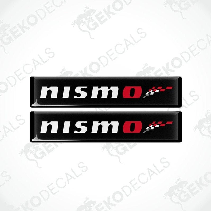 Two black vinyl stickers with red and white NISSAN NISMO logo design.