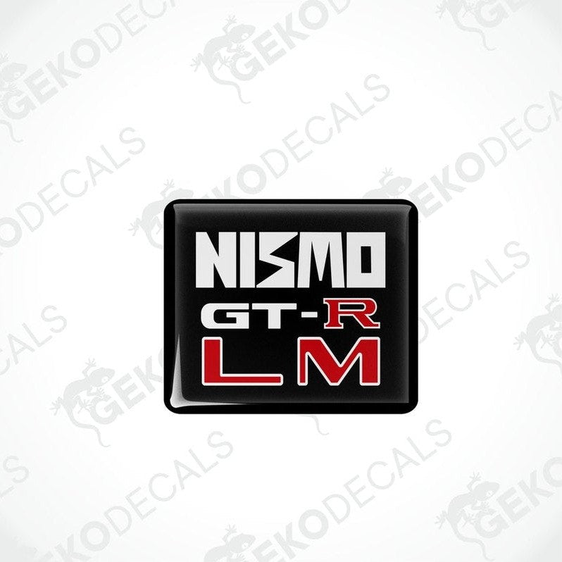 Square black vinyl decals with 'NISMO GT-R LM' written in white and red text.