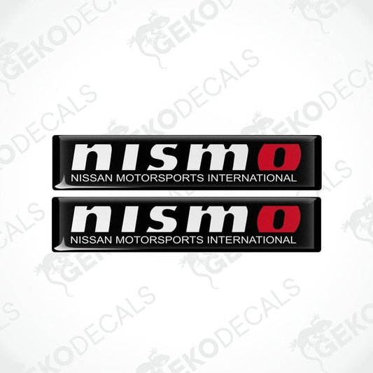 Two black, red, and white NISMO decals for vehicles.