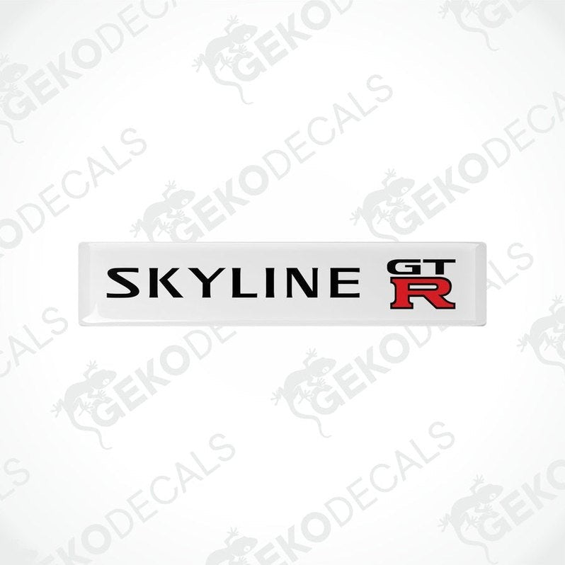  Withe, red, and black decals with the text 'SKYLINE GT R' on them, designed for vehicle use.