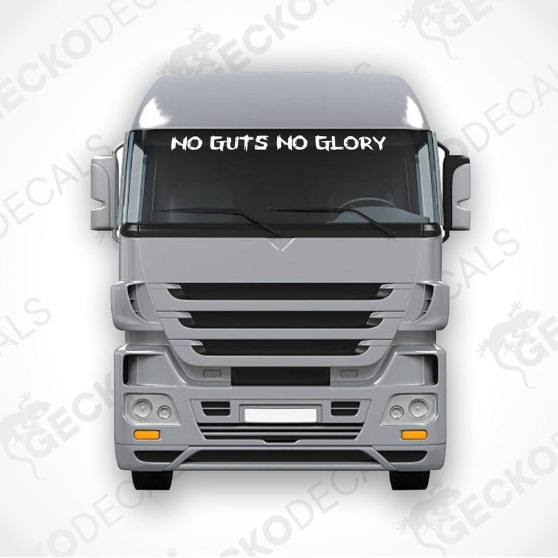 A die cut decal with the phrase 'NO GUTS NO GLORY' printed on it, positioned on the front window of a gray truck.
