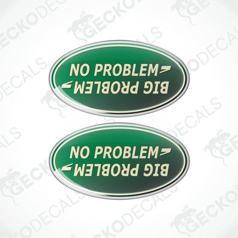 Two green, white, and black vinyl decals with the phrases 'NO PROBLEM' and 'BIG PROBLEM' on an oval background.