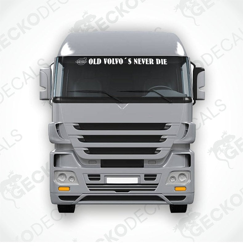 A decal with the text 'OLD VOLVO'S NEVER DIE' positioned on the front windshield of a Volvo truck.